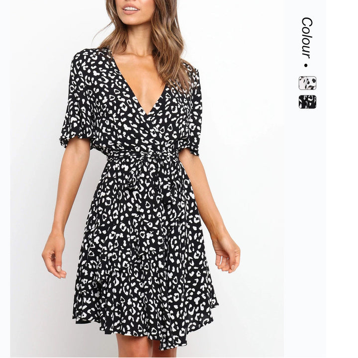 Women's wrap dress with generous ruffle sleeves and beautiful animal print Skovae