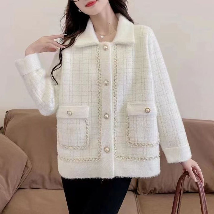 Damernes elegantejakke med tidløs houndstooth mønster Stilla