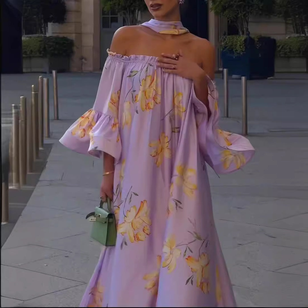 Kvinders elegante maxikjole med off-shoulder design og flæseærmer