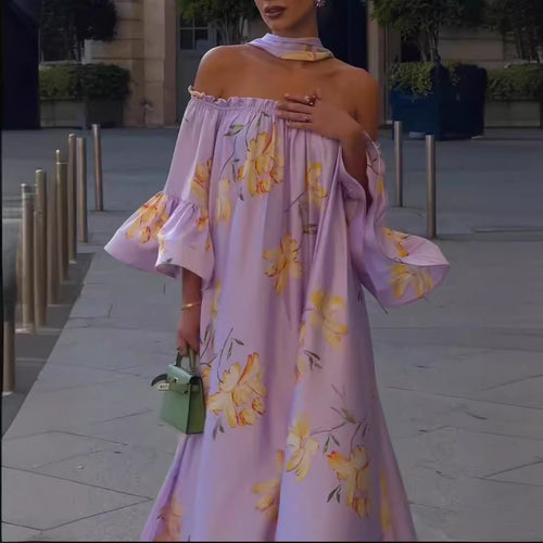 Kvinders elegante maxikjole med off-shoulder design og flæseærmer