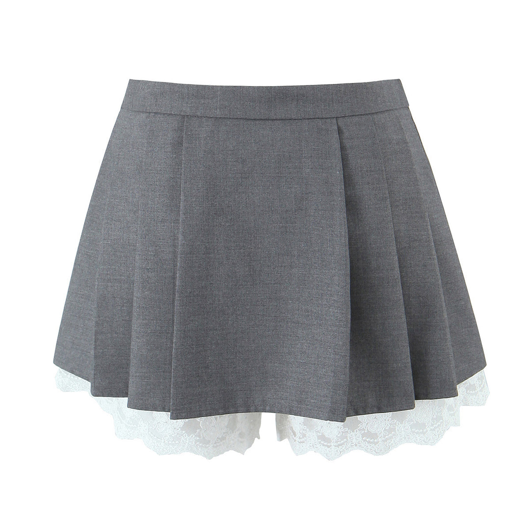 Dame plissee-nederdel med elegante spidsaksepter og asymmetrisk kant Stilla
