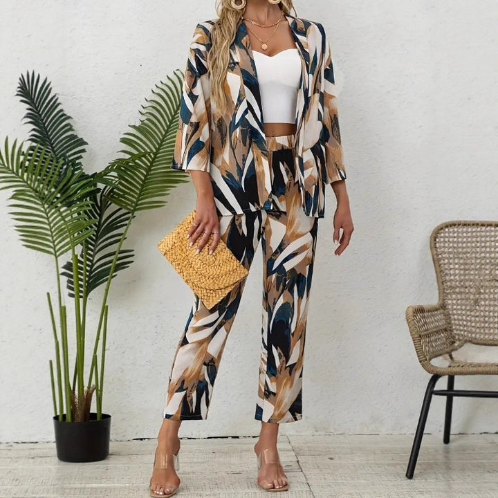 Dame To-delt Floral-outfit med løstsiddende blazerjakke og elegant bukser Stilla