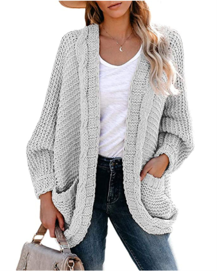 Kvinders chunky strikket cardigan med afslappede lommer og voluminøse ærmer Stilla