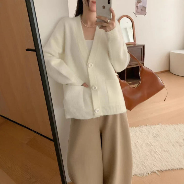 Kvinders fluffy knap cardigan med elegante lommer Stilla