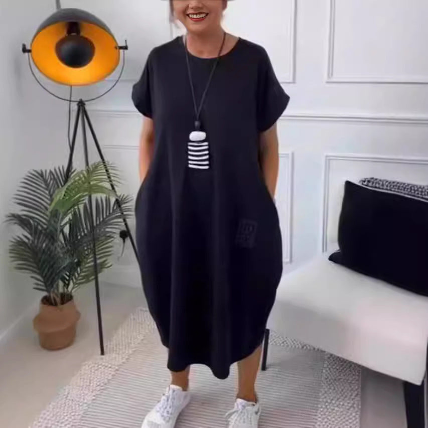 Dame afslappet Sweatdress med praktiske lommer og moderne skrift Stilla