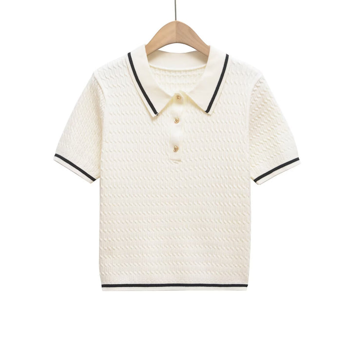Dame polo shirt med struktureret materiale og fine knapdetaljer Skovae
