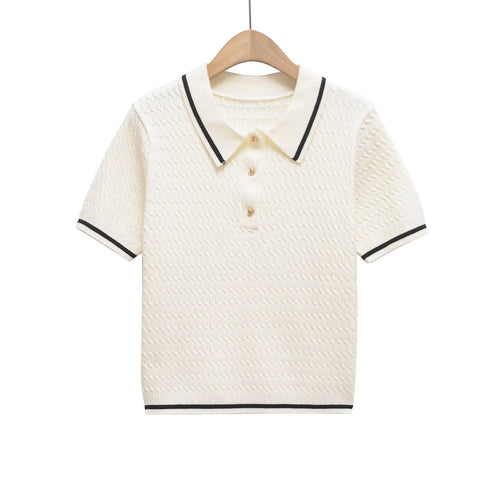 Dame polo shirt med struktureret materiale og fine knapdetaljer Skovae