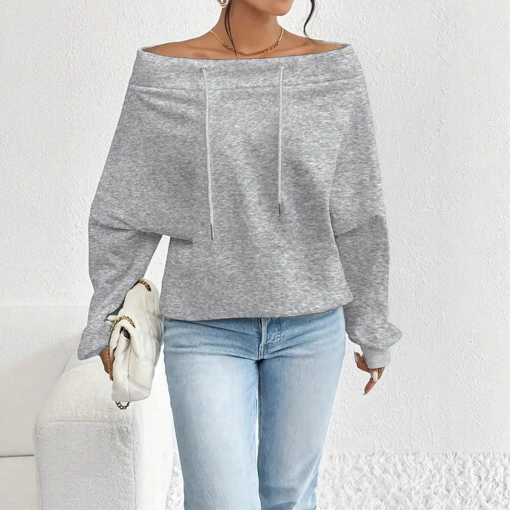 Kvinders afslappede oversized pullover med åben krave og praktiske snore