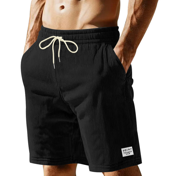 Herre nan knælange Lounge-shorts i ribbet struktur jersey med elastisk snor i taljen og påsyede lommer Skovae