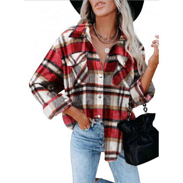 Dame ternet bluse i afslappet oversized stil med lommer Stilla