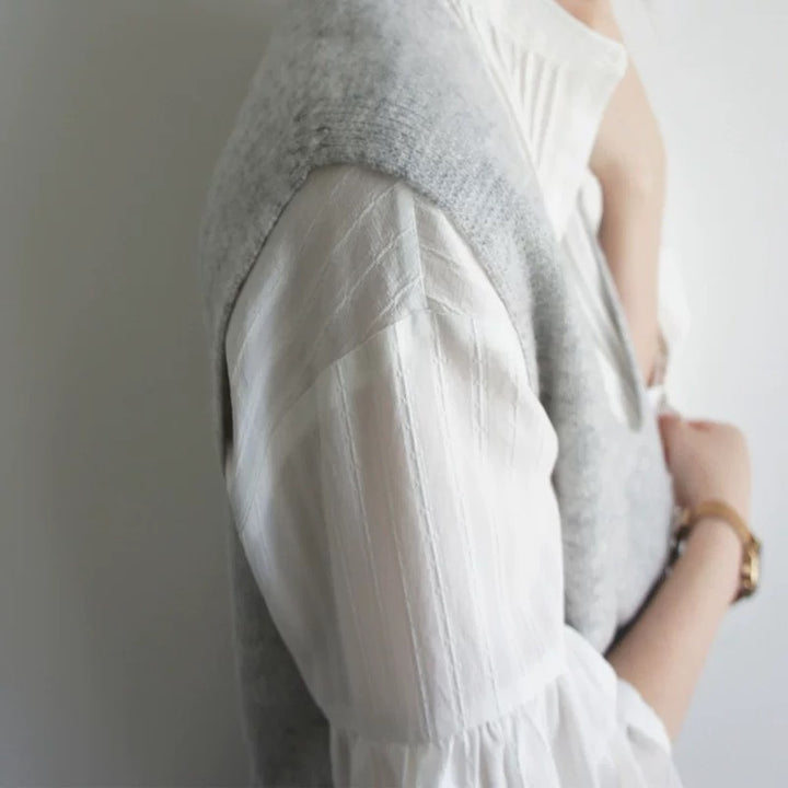 Damebluse med voluminøse ærmer og elegant plissébehandling Stilla