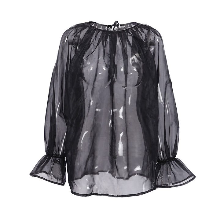 Dame gennemsigtig bluse med voluminøse ærmer og smart design Stilla
