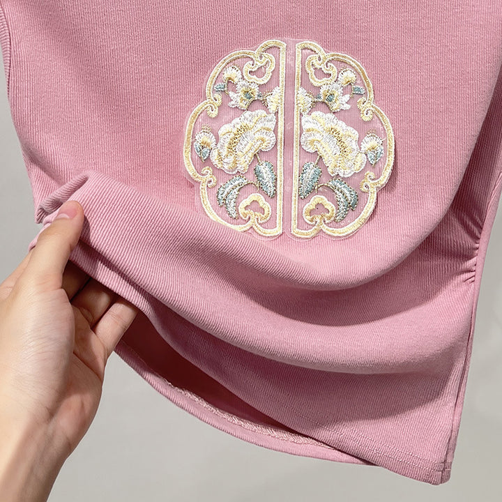 Dame T-shirt med kunstnerisk broderidesign og innovativ slids Stilla
