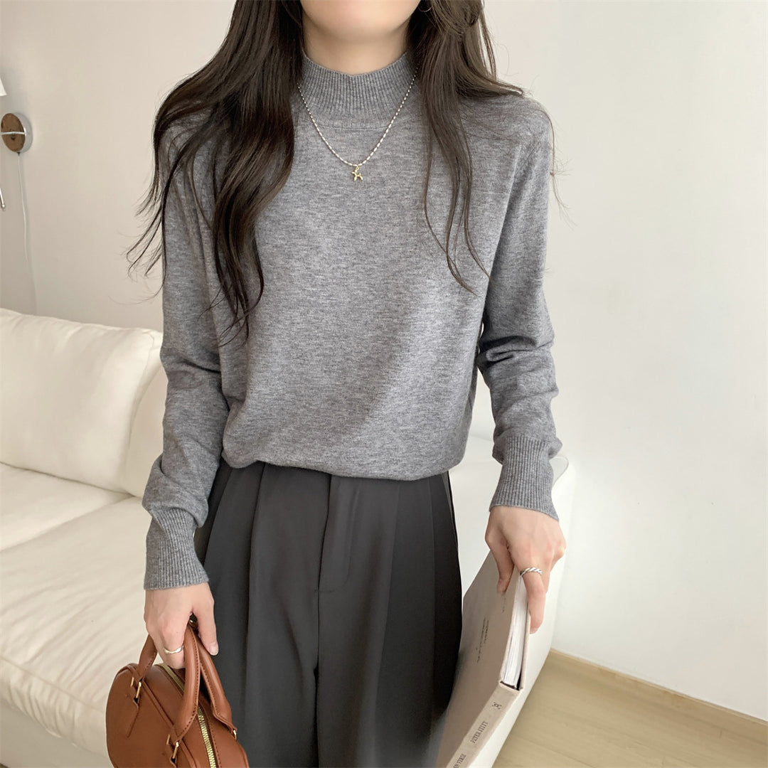 Dame finstrikket sweater med moderne ståkrave og afslappet pasform Stilla