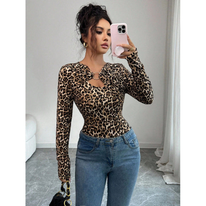 Dame bodysuit med dekorativt ringdetalje og lange ærmer Skovae