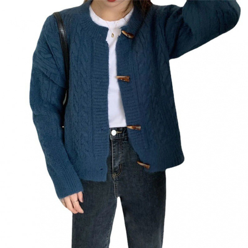 Kvinders cardigan med kabelstrik mønster og elegante knapdetaljer Stilla
