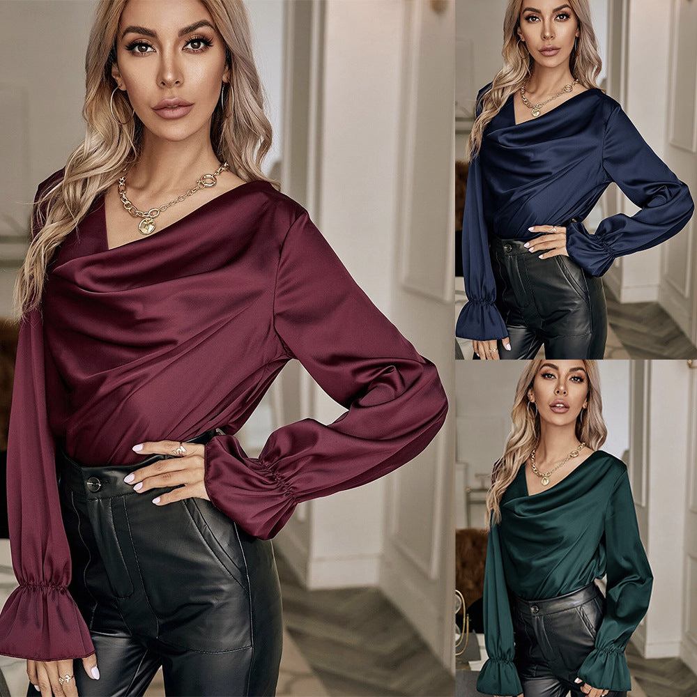 Damebluse med elegant drapering og voluminøse ærmer Stilla
