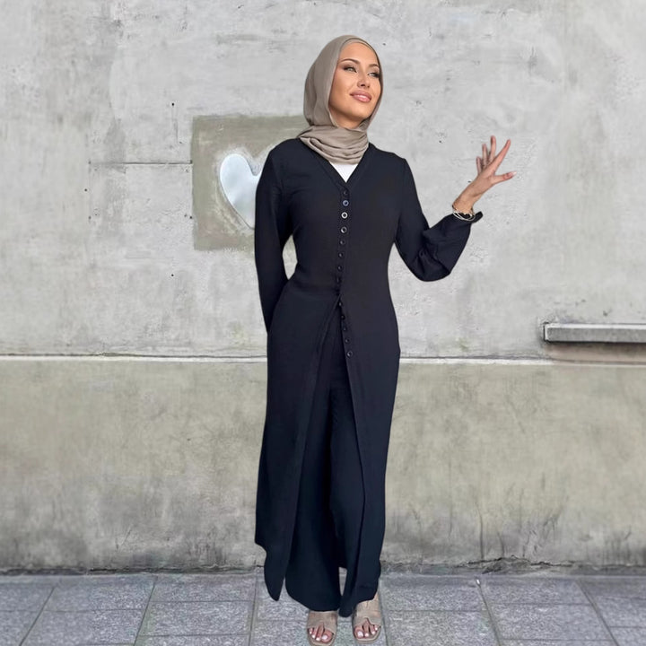 Kvinders jumpsuit med elegant knappedesign og brede ben Skovae
