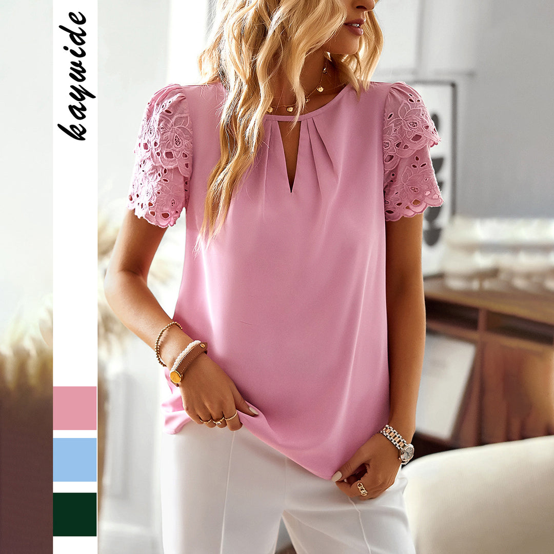 Dame-bluse med elegante spidsærmer og diskret knaplukning Stilla
