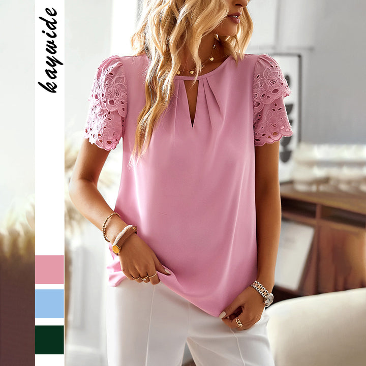 Dame-bluse med elegante spidsærmer og diskret knaplukning Stilla