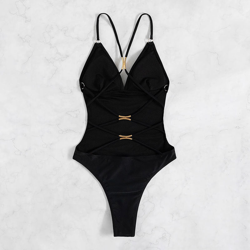 Dame jumpsuit badedragt med dyb V-hals og elegante stropper Skovae