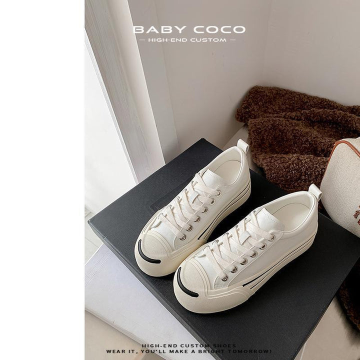 Dame retro-inspirerede canvas-sneakers med karakteristisk gummispids Stilla