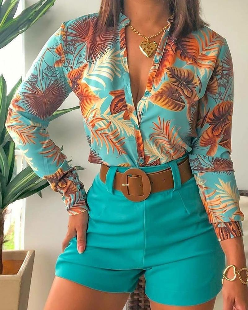 Damebluse med blomsterdesign og elegant snit Stilla