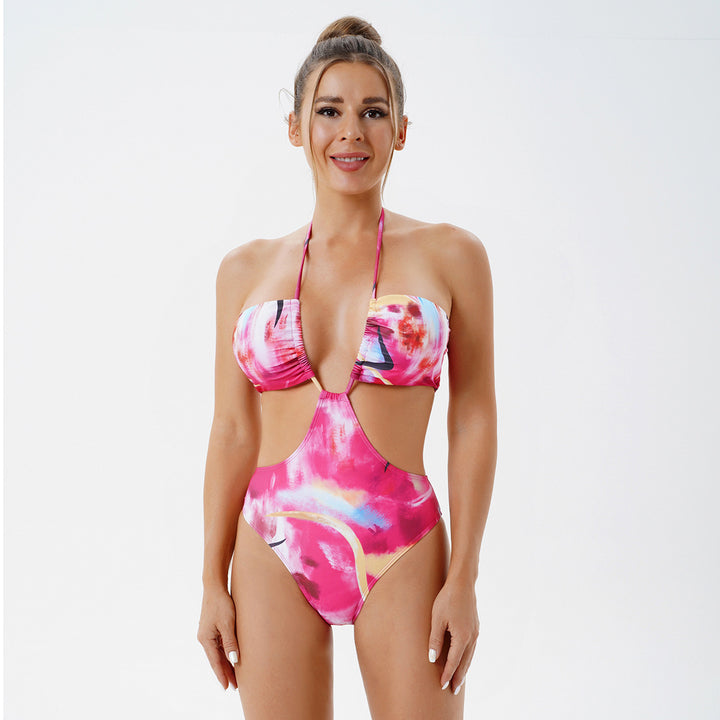 Dame badedragt med moderne cut-out-design og smart omslagsskjørt Stilla