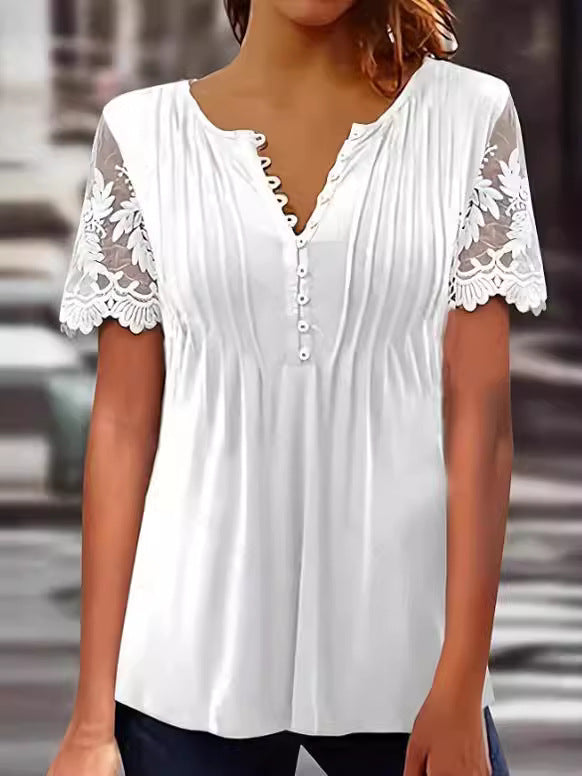 Damebluse med spidse detaljer og plissering Stilla