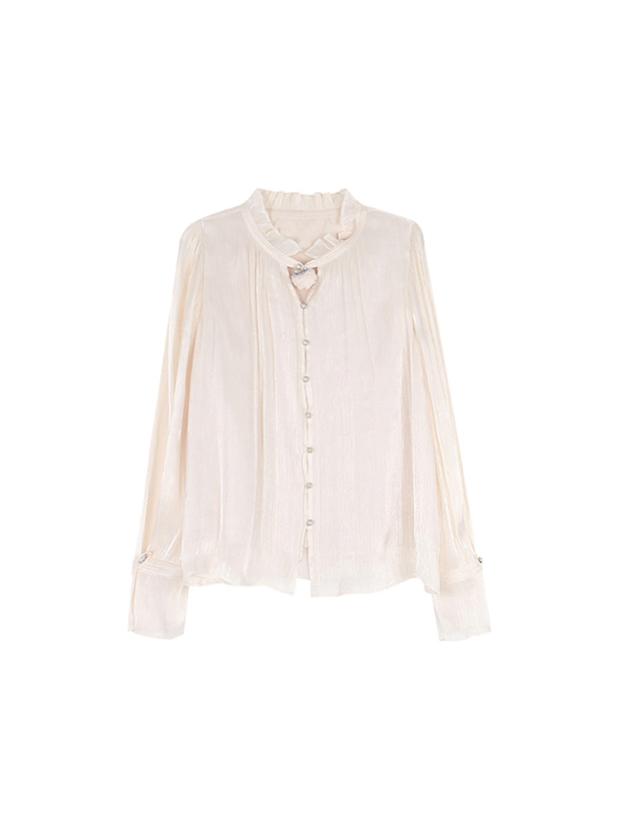 Dame chiffonbluse med elegante ruffles detaljer og knaplukning Stilla