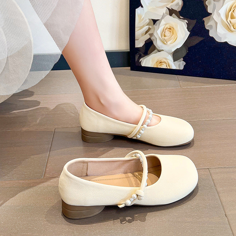 Dame Ballerinas med elegant rem og moderne perleaccent Stilla