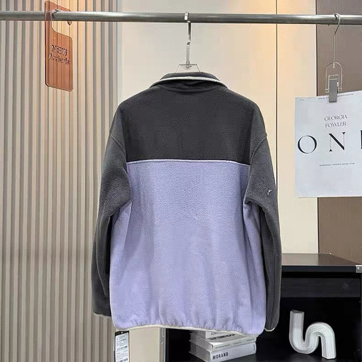 Women's fleece pullover with high collar and practical pockets Stilla