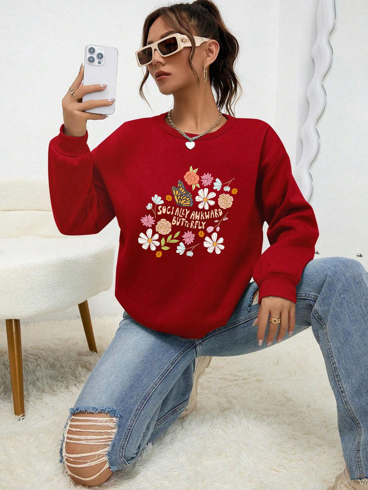 Kvinders sweatshirt med kreativ blomster mønster og inspirerende print Stilla