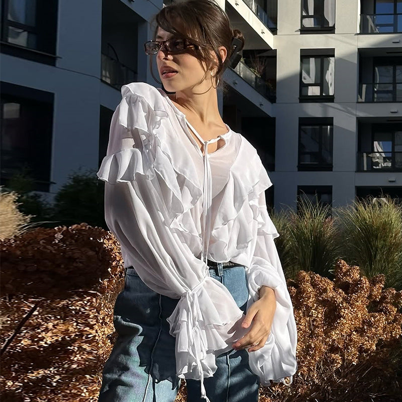 Damer ruffle blouse med gennemsigtige ærmer og sløjfe lukning Stilla