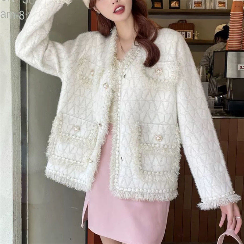 Kvinders fluffy cardigan med elegante knapdetaljer og dekorativ kant Stilla