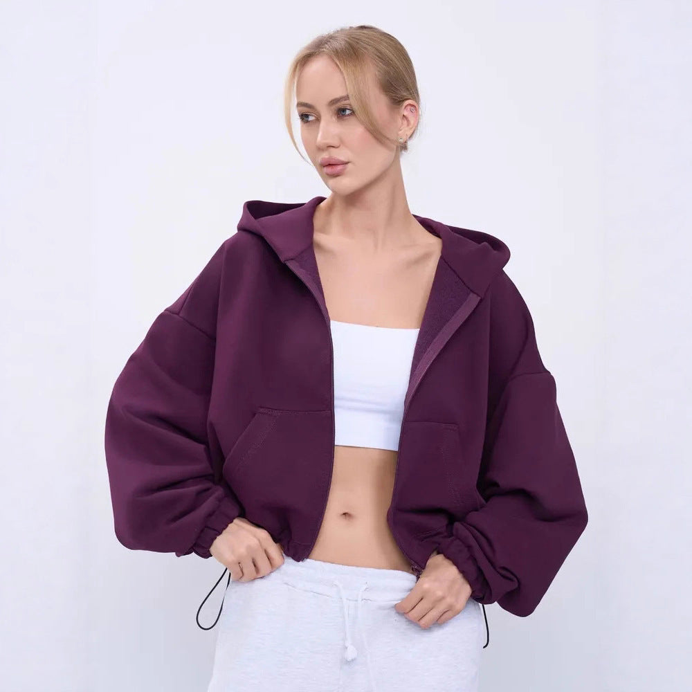 Dame cropped hoodie jakke med voluminøse ærmer og praktiske lommer Skovae