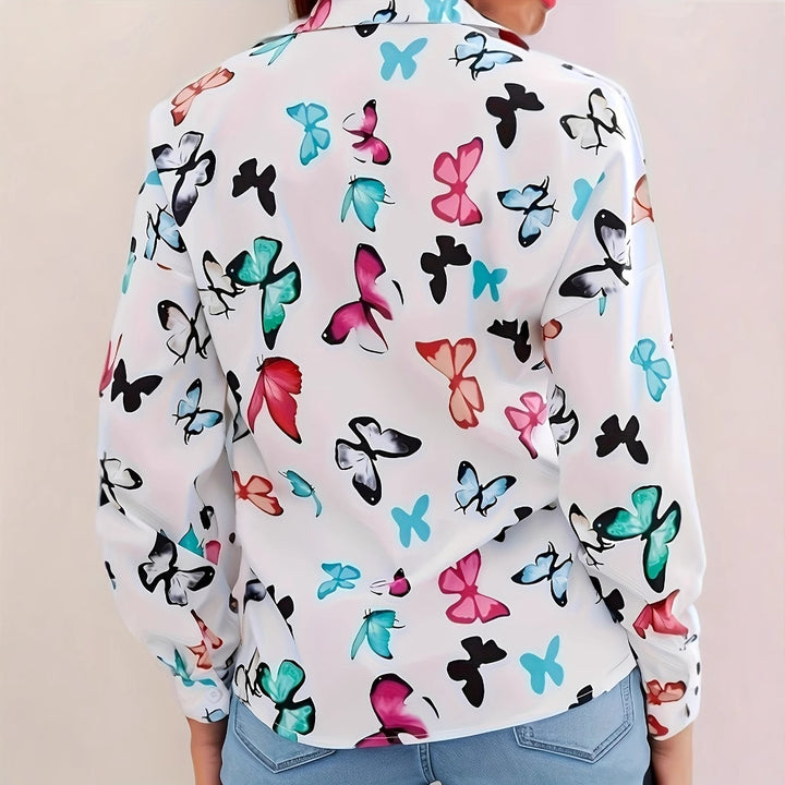 Damebluse med farverigt sommerfugledesign og afslappet snit Stilla