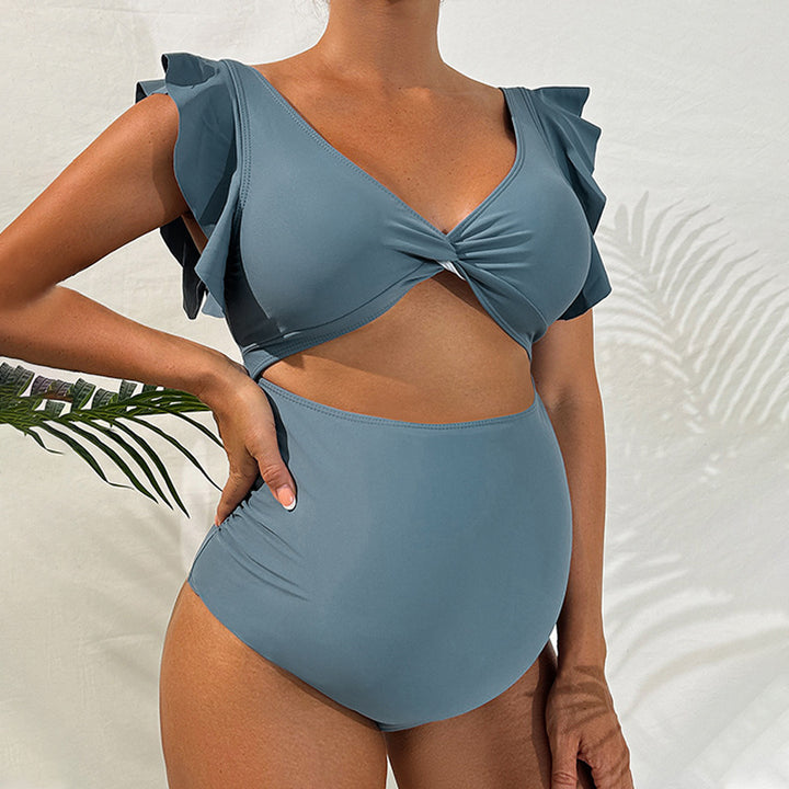Dame one-piece swimsuit with romantic ruffle details Skovae