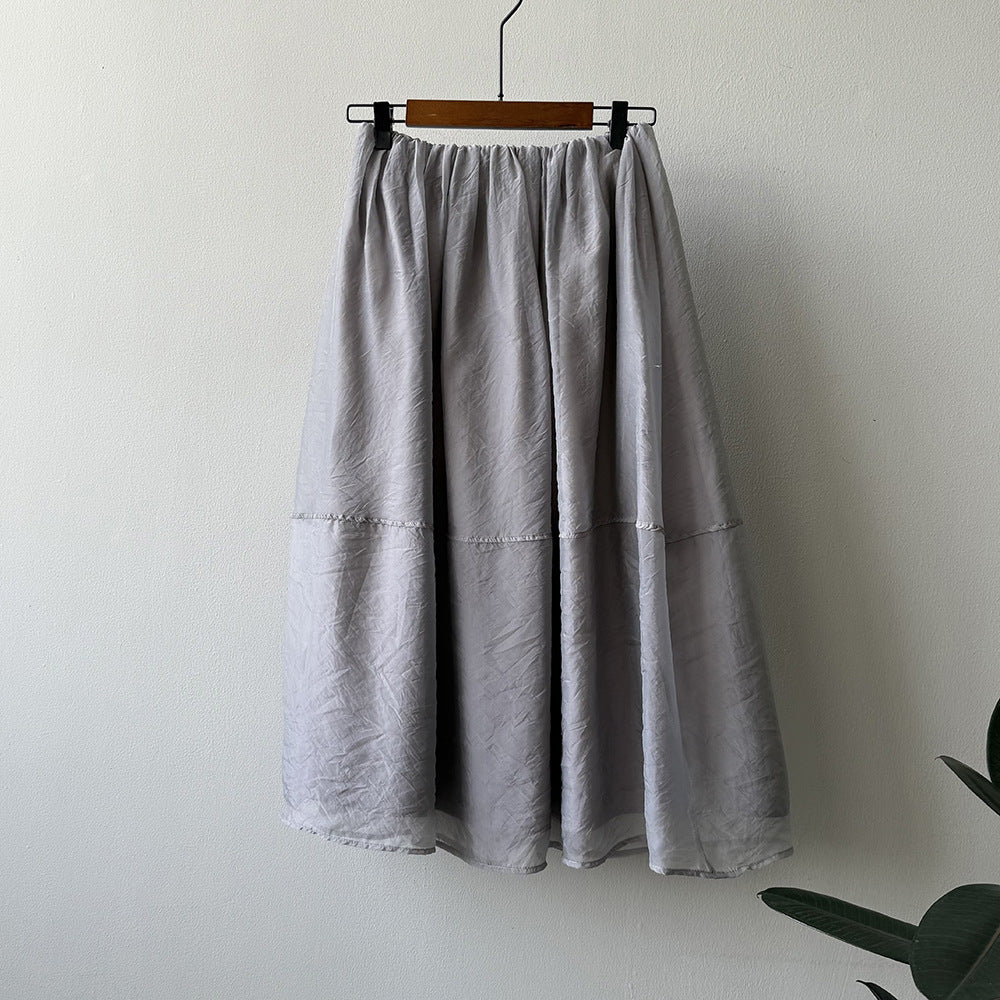 Dame Maxiskirt i let, åndbart materiale med elastisk talje og elegant snit Stilla