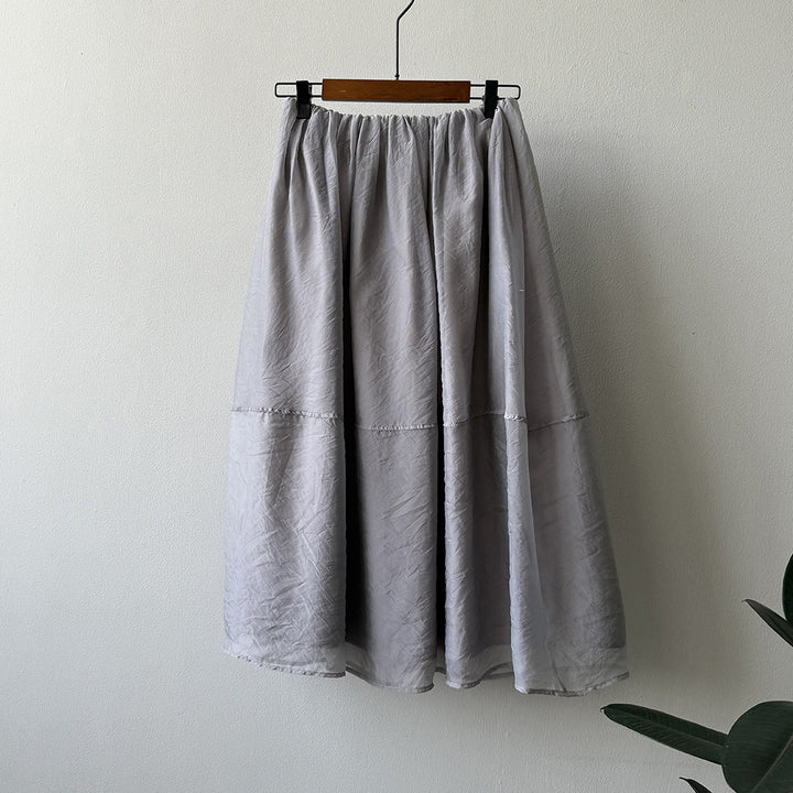 Dame Maxiskirt i let, åndbart materiale med elastisk talje og elegant snit Stilla