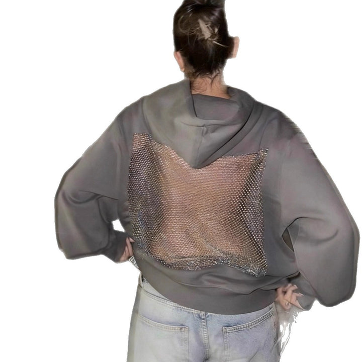 Dame med hættesweatshirt med transparent broderet rygparti Skovae