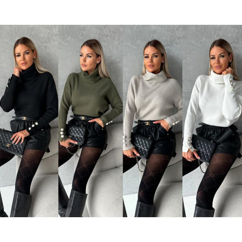 Dame rullekravepullover med dekorative knapper og bred pasform Stilla