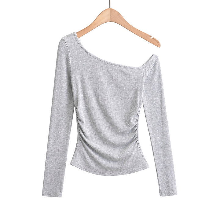 Dame asymmetrisk longsleeve-top med elegant ruffle-design og figurformende snit Stilla