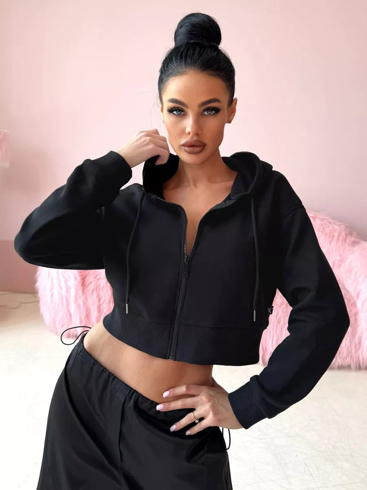 Kvinders cropped hoodie med lynlås og sidelommer Skovae