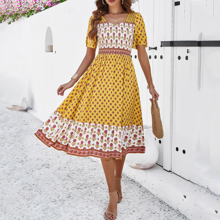 Dame Maxikjole med legende blomstermønster og elegant flæse Stilla