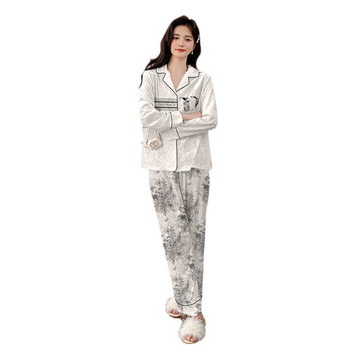 Dame luksus natwear sæt med blomstermønster og elegant design Stilla