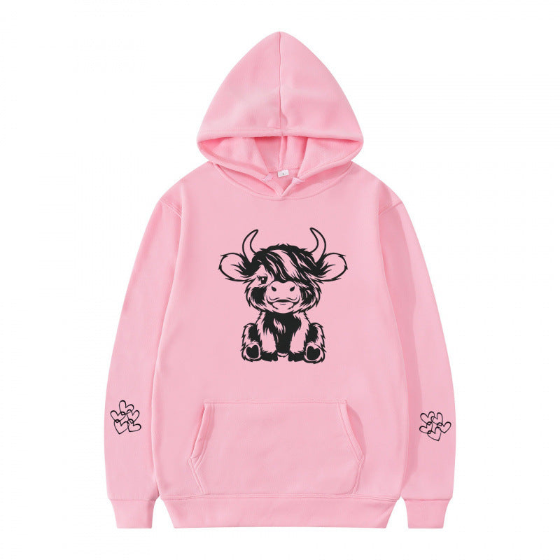 Kvindernes hætte sweatshirt med charmerende kvægmotiv og praktiske kængurulommer Skovae