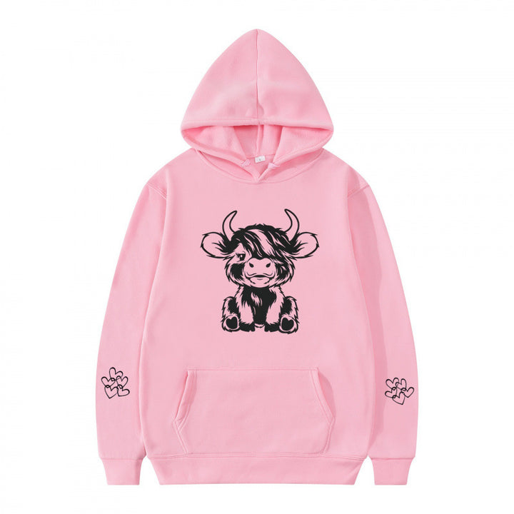 Kvindernes hætte sweatshirt med charmerende kvægmotiv og praktiske kængurulommer Skovae