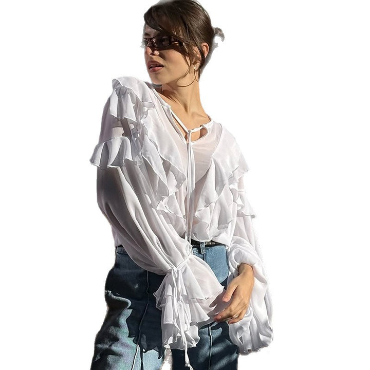 Damer ruffle blouse med gennemsigtige ærmer og sløjfe lukning Stilla