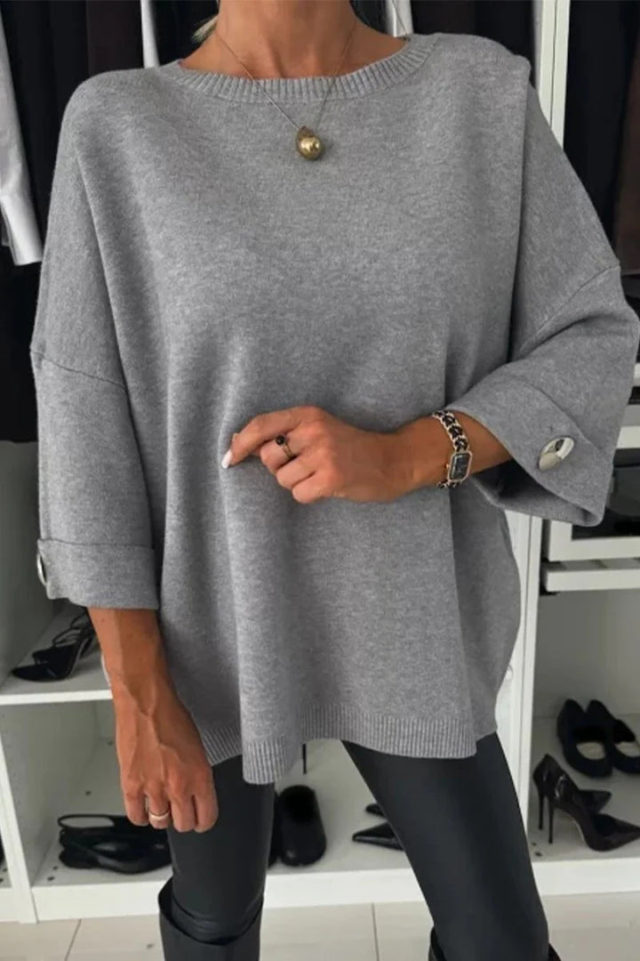 Damer mode oversized sweater med elegante knapdetaljer Stilla